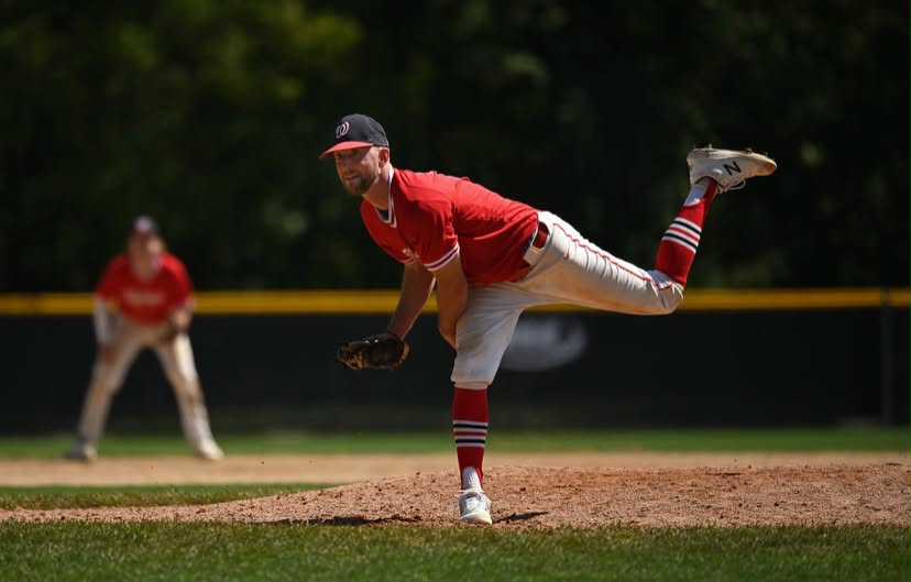 Pat Tschida delivering a pitch during a townball game