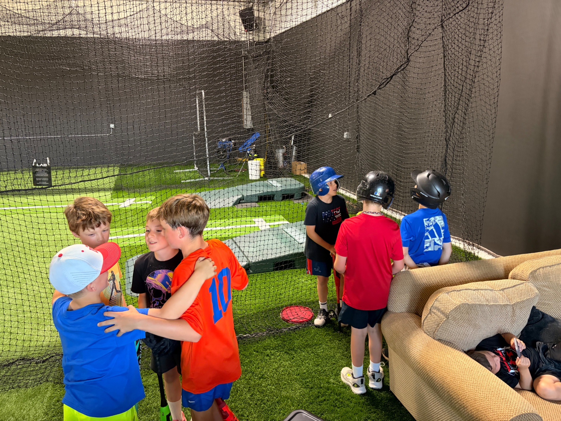Young players celebrating together at The Lab